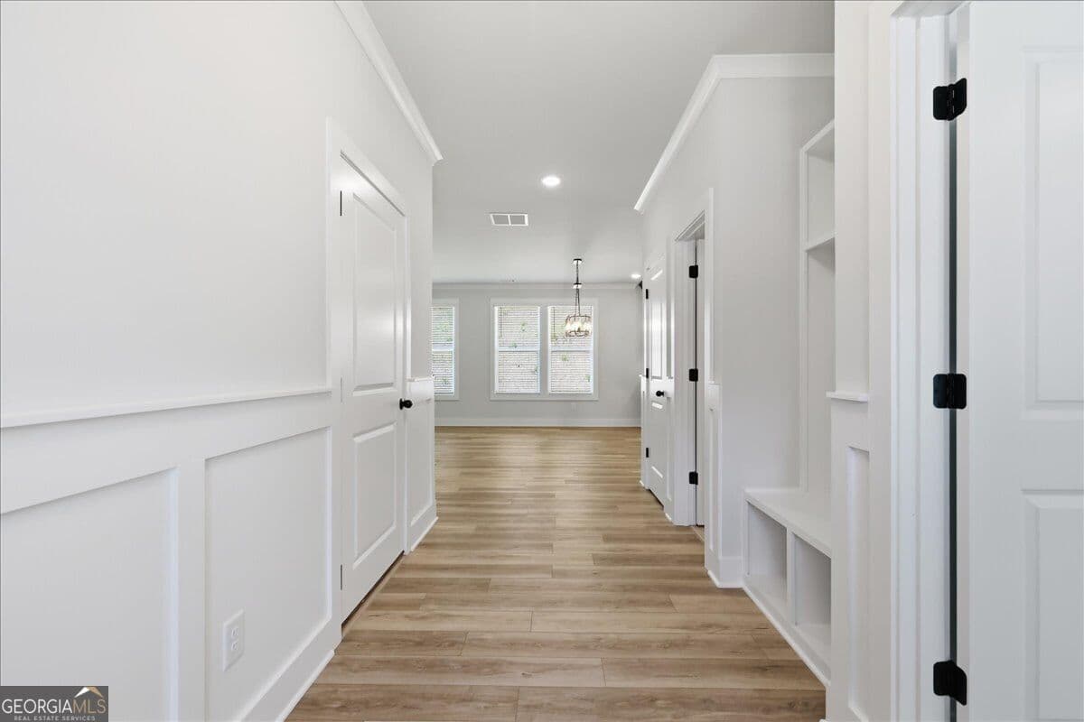 6 bedroom, 4 bathroom, 2,959 sq ft single family residence for sale at 2420 Reserve Manor Court, Lawrenceville, GA 30043 — photo 5