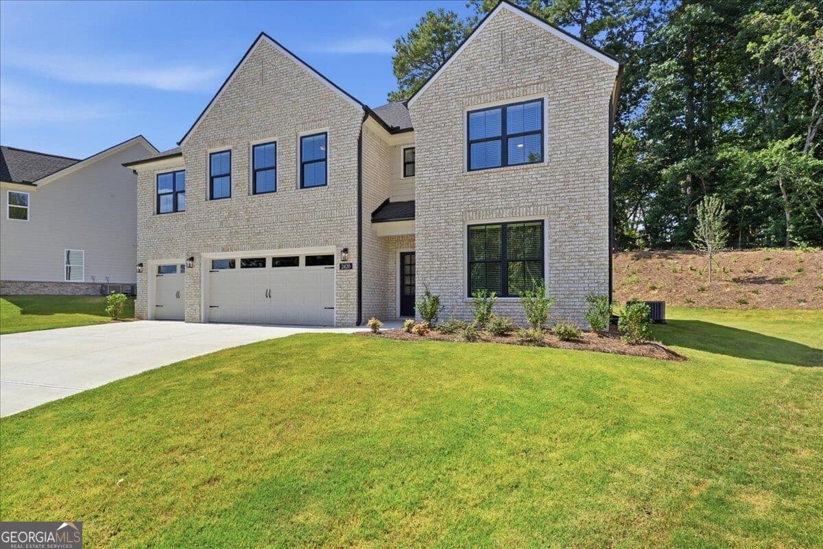 6 bedroom, 4 bathroom, 2,959 sq ft single family residence for sale at 2420 Reserve Manor Court, Lawrenceville, GA 30043 — photo 4