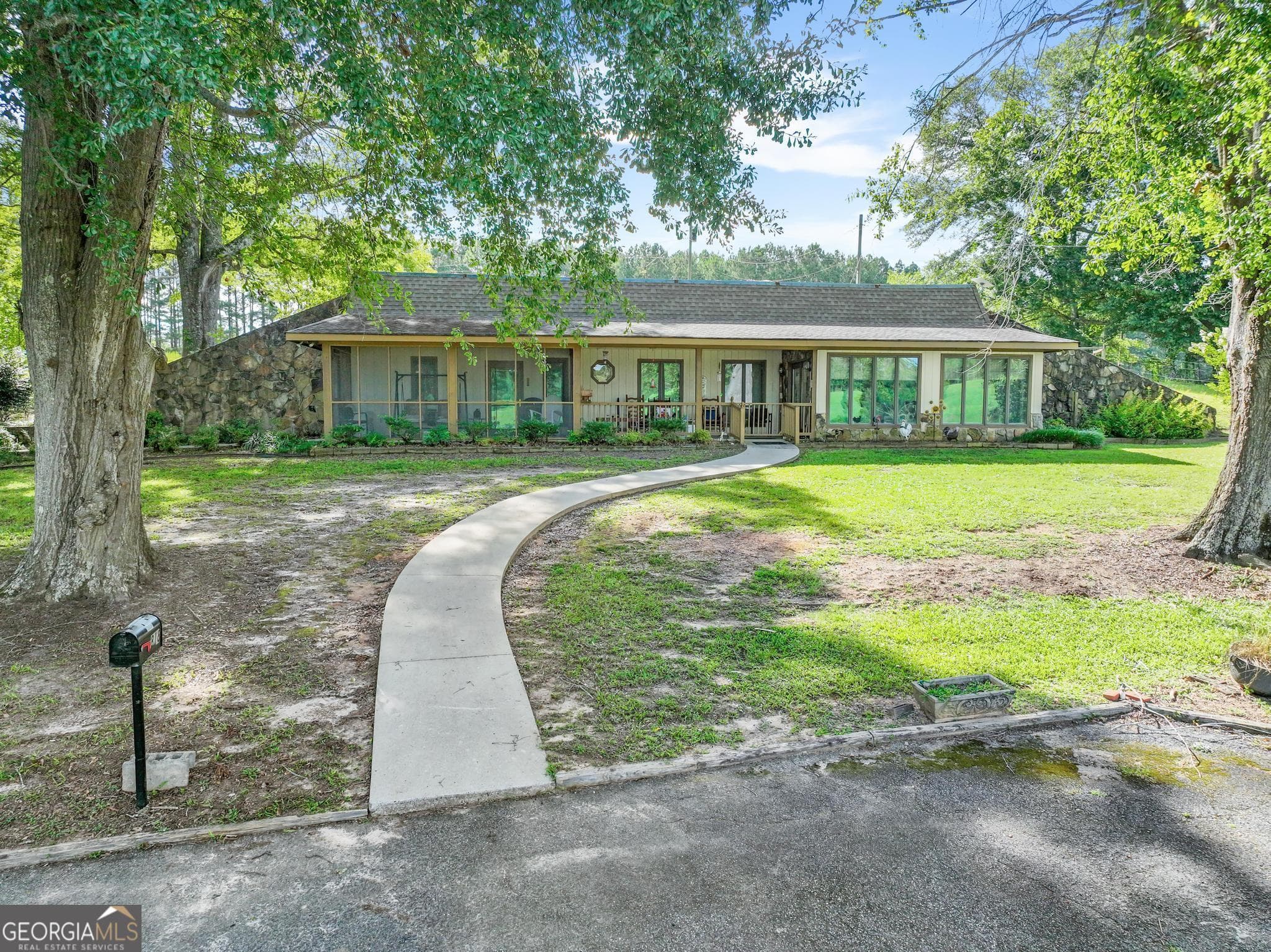 3 bedroom, 2 bathroom, 2,000 sq ft single family residence for sale at 818 McCrary Road, Molena, GA 30258