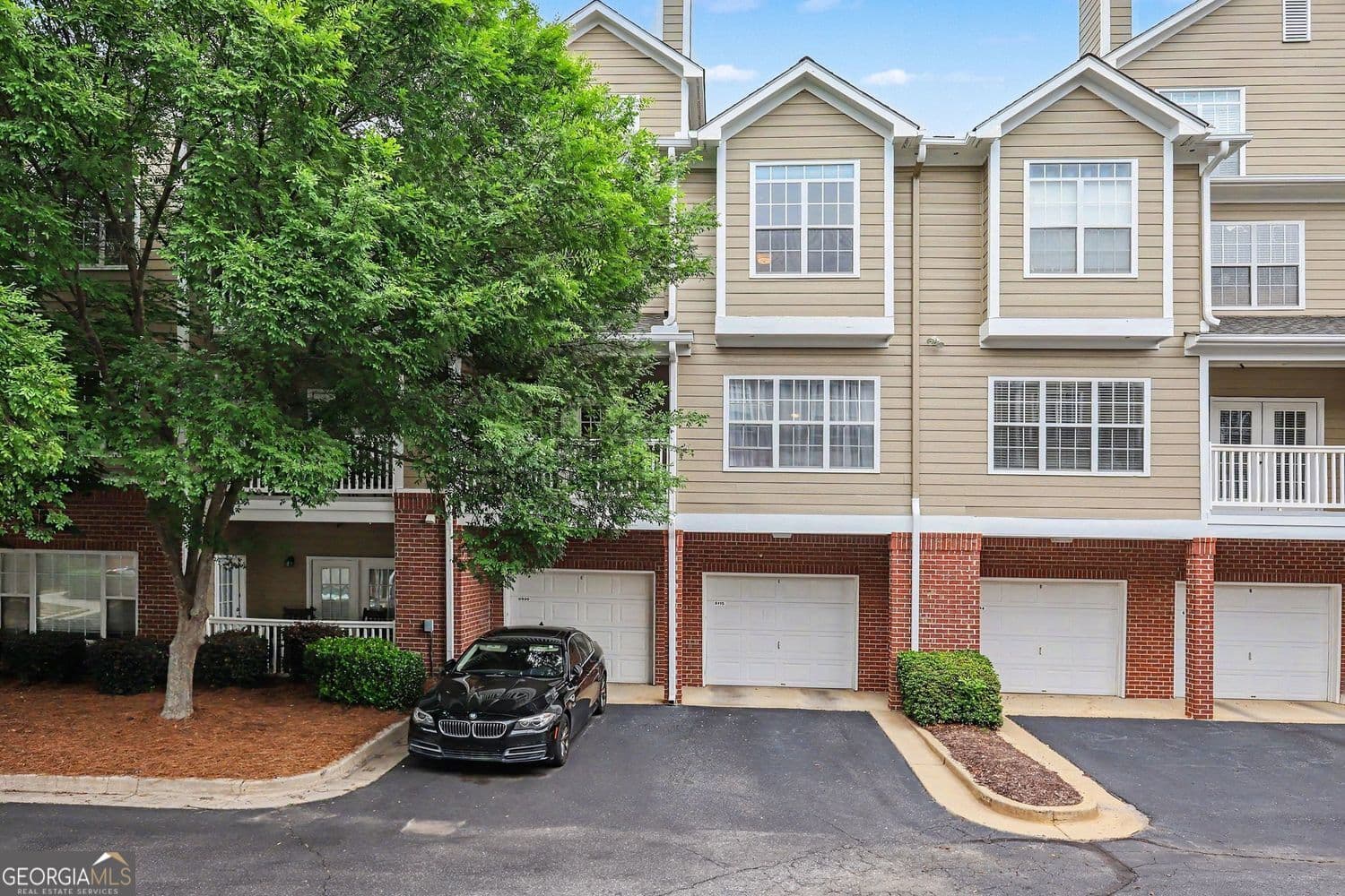 2 bedroom, 2.5 bathroom, 1,379 sq ft townhouse for sale at 6115 Woodland Lane, Alpharetta, GA 30009