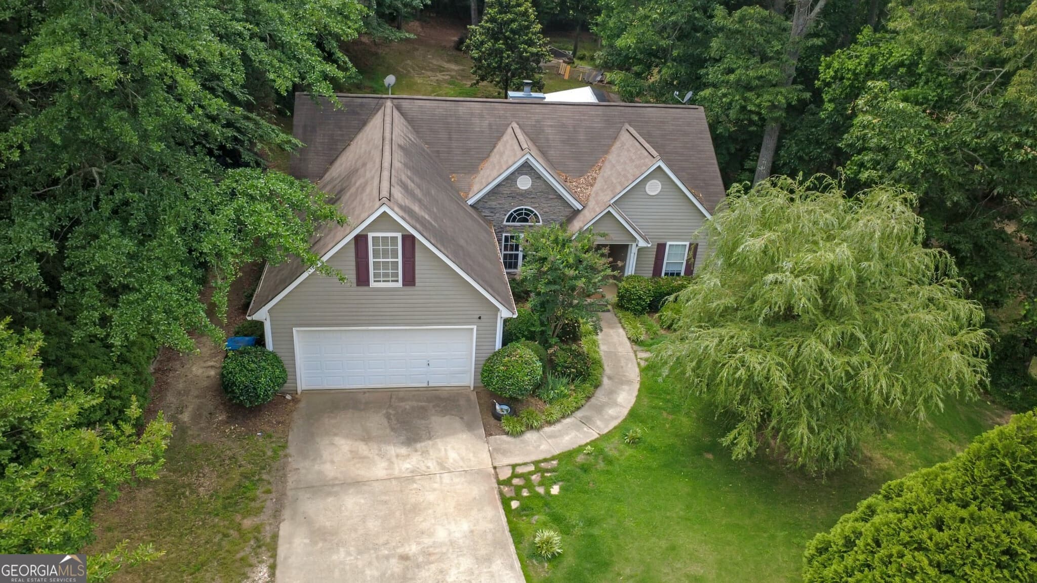 4 bedroom, 2 bathroom, 1,772 sq ft single family residence for sale at 2657 Wildwind Drive, Bethlehem, GA 30620 — photo 2