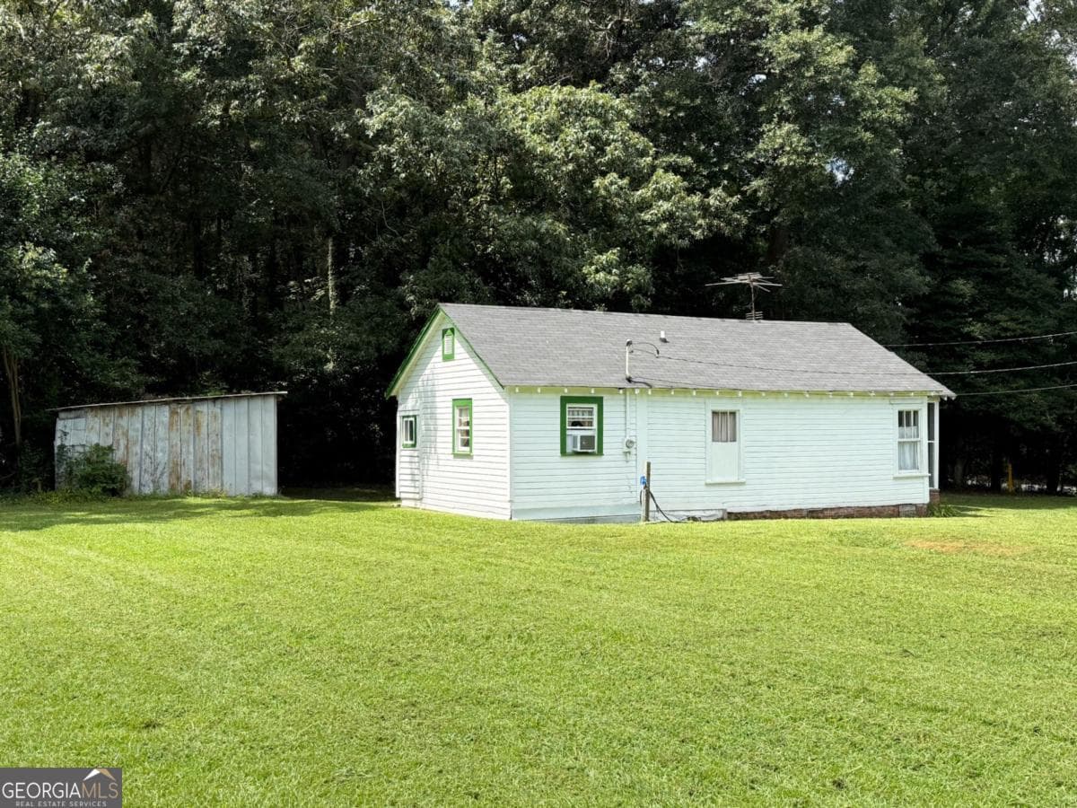 1 bedroom, 1 bathroom, 608 sq ft single family residence for sale at 7514 Ga Highway 17, Bowersville, GA 30516 — photo 2