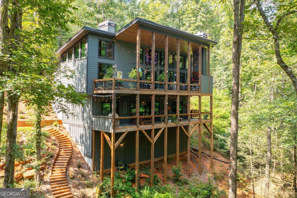 3 bedroom, 3.5 bathroom, 2,807 sq ft single family residence sold at 414 Watersong Trail 12, Ellijay, GA 30540