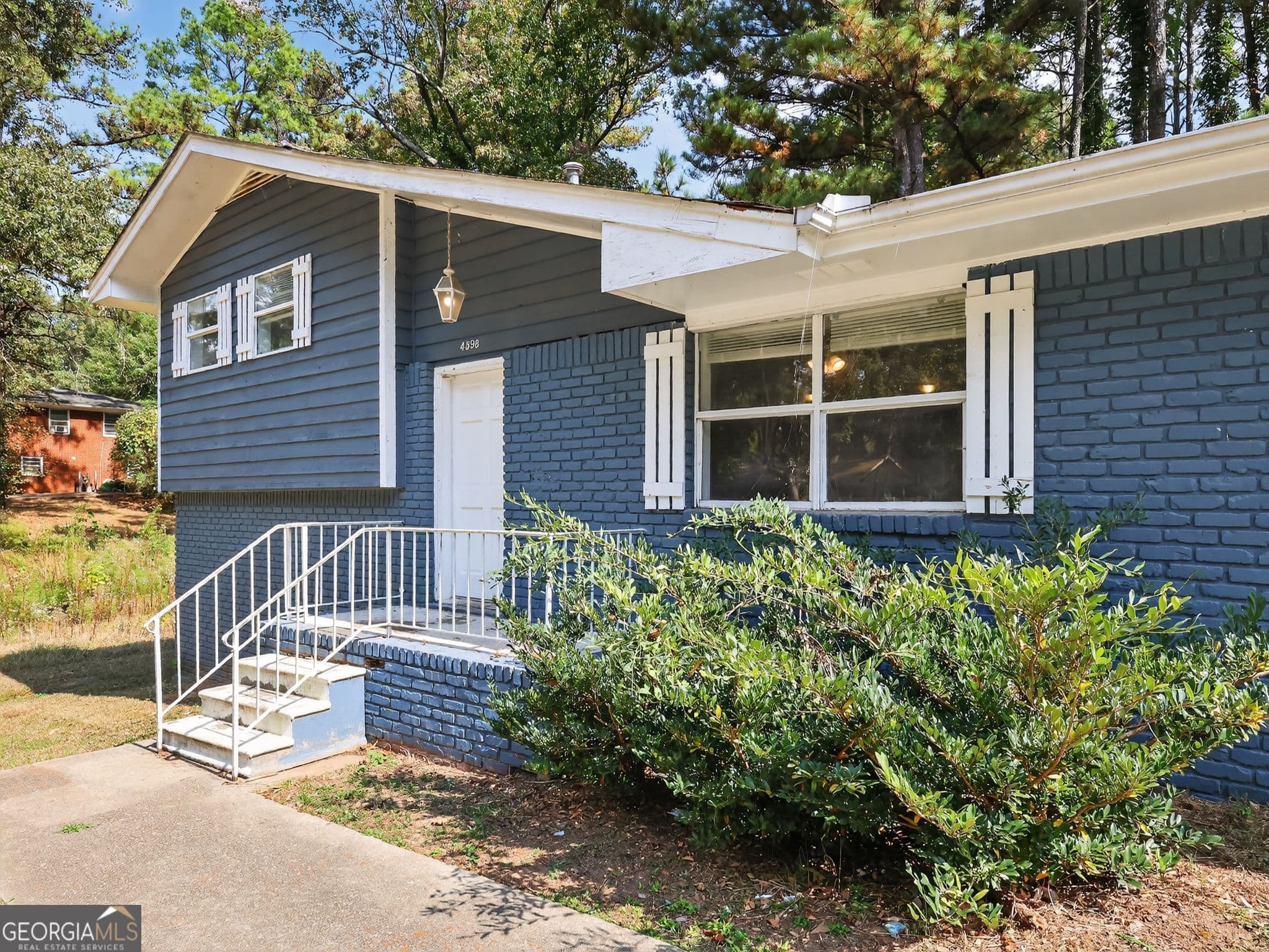 4 bedroom, 2 bathroom, 1,447 sq ft single family residence for sale at 4598 Ashmore Drive, Forest Park, GA 30297 — photo 2