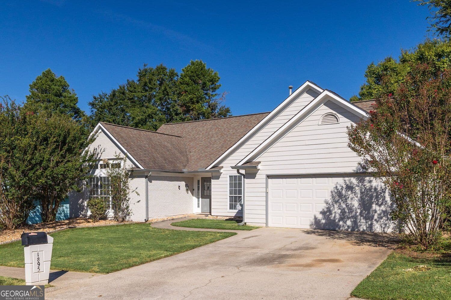 4 bedroom, 2 bathroom, 1,974 sq ft single family residence for sale at 1895 Conners Court, Lawrenceville, GA 30044 — photo 2