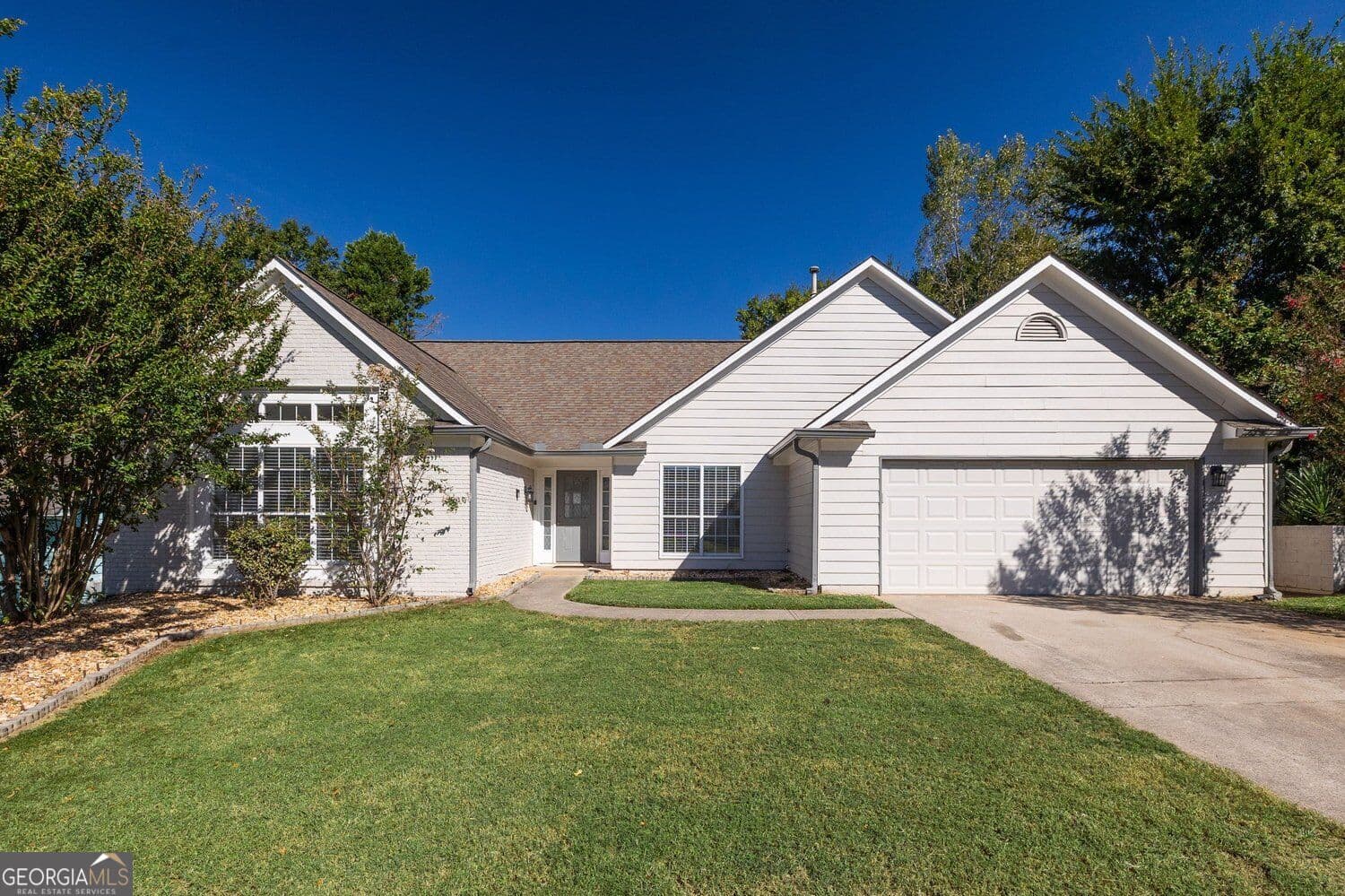 4 bedroom, 2 bathroom, 1,974 sq ft single family residence for sale at 1895 Conners Court, Lawrenceville, GA 30044 — photo 1 of 42