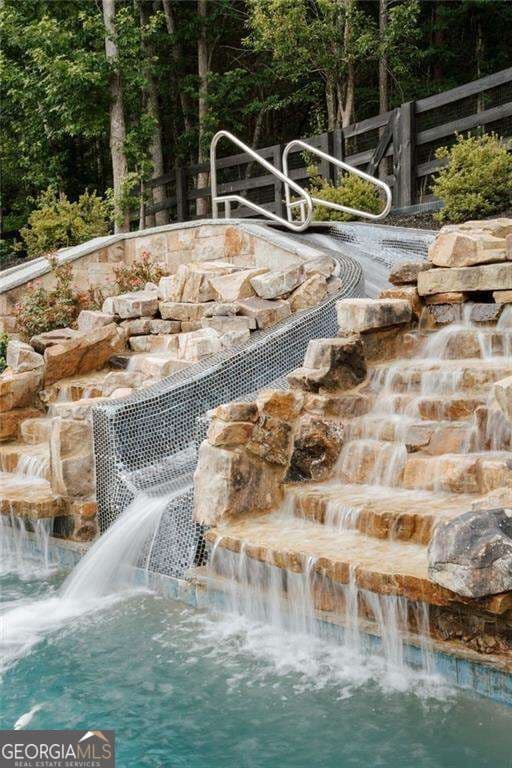 6 bedroom, 5 bathroom, 5,400 sq ft single family residence for sale at 5475 Summit Oak Drive, Milton, GA 30004 — photo 7
