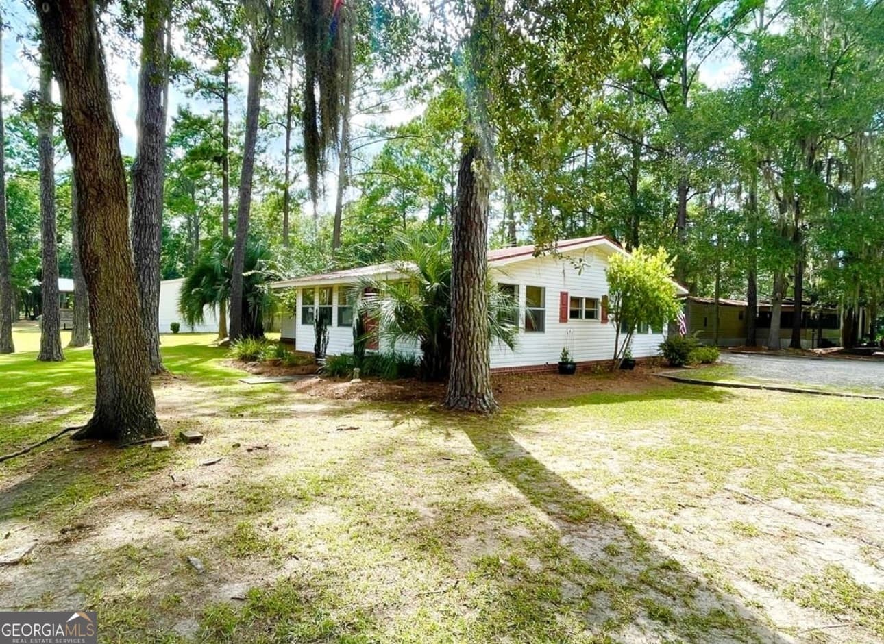 3 bedroom, 2 bathroom, 1,668 sq ft manufactured home,mobile home under contract at 1031 Moore Haven Circle, Townsend, GA 31331 — photo 2