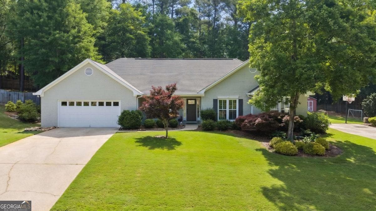 4 bedroom, 2.5 bathroom, 2,554 sq ft single family residence sold at 409 Taberon Road, Peachtree City, GA 30269