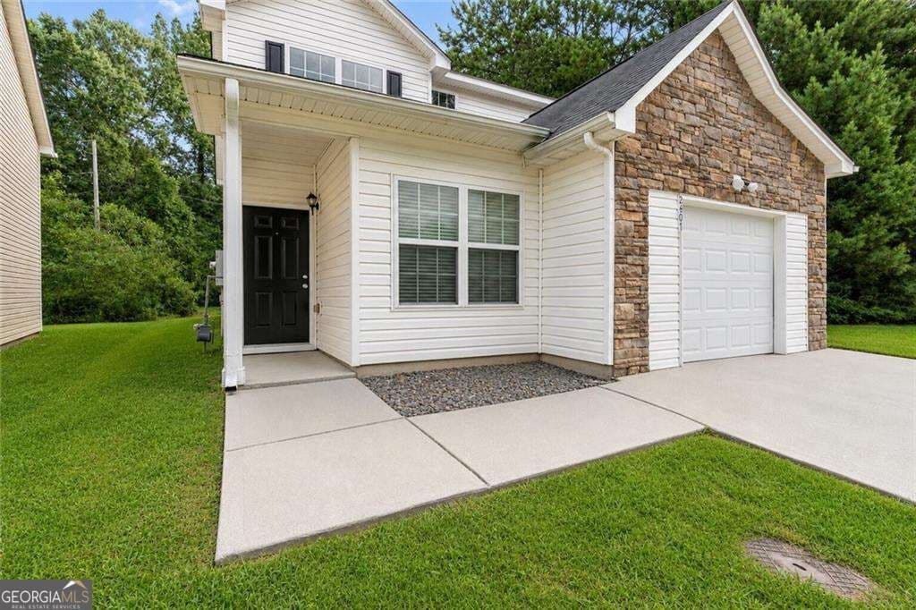 4 bedroom, 2.5 bathroom, 1,880 sq ft single family residence for sale at 2407 Hackamore Drive, South Fulton, GA 30349 — photo 2