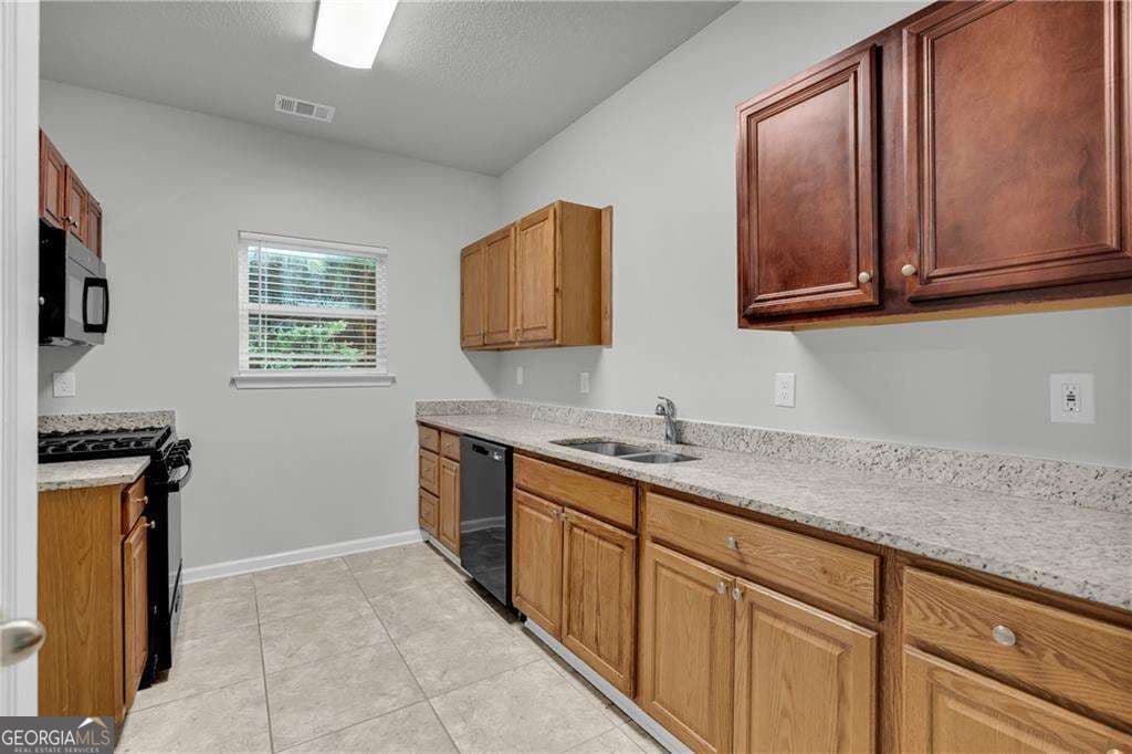 4 bedroom, 2.5 bathroom, 1,880 sq ft single family residence for sale at 2407 Hackamore Drive, South Fulton, GA 30349 — photo 9