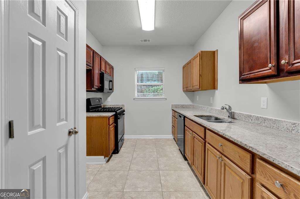 4 bedroom, 2.5 bathroom, 1,880 sq ft single family residence for sale at 2407 Hackamore Drive, South Fulton, GA 30349 — photo 8