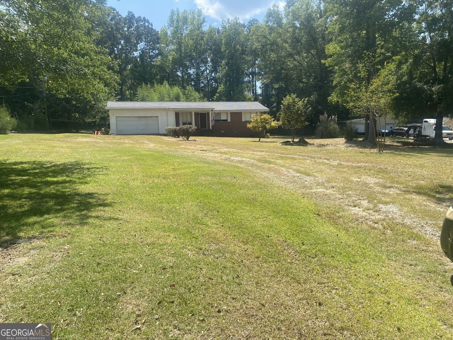 3 bedroom, 1 bathroom, 1,080 sq ft single family residence for sale at 1275 W Macedonia Church Road, Oxford, GA 30054
