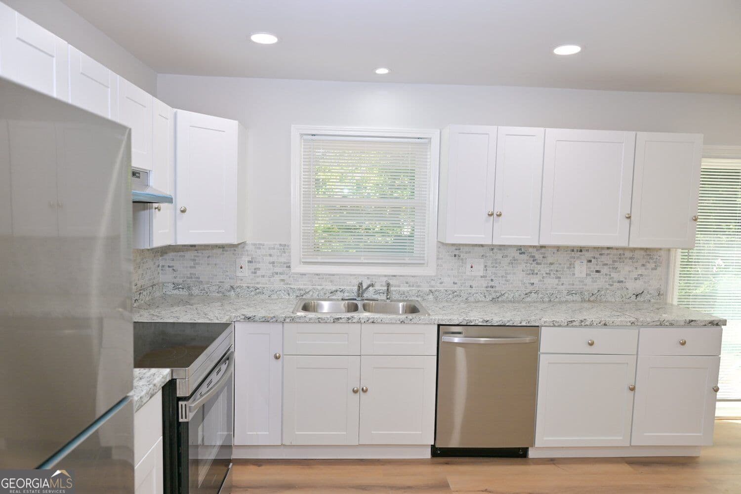 3 bedroom, 2 bathroom, 1,235 sq ft single family residence for sale at 586 E Glochester Place, Norcross, GA 30071 — photo 7