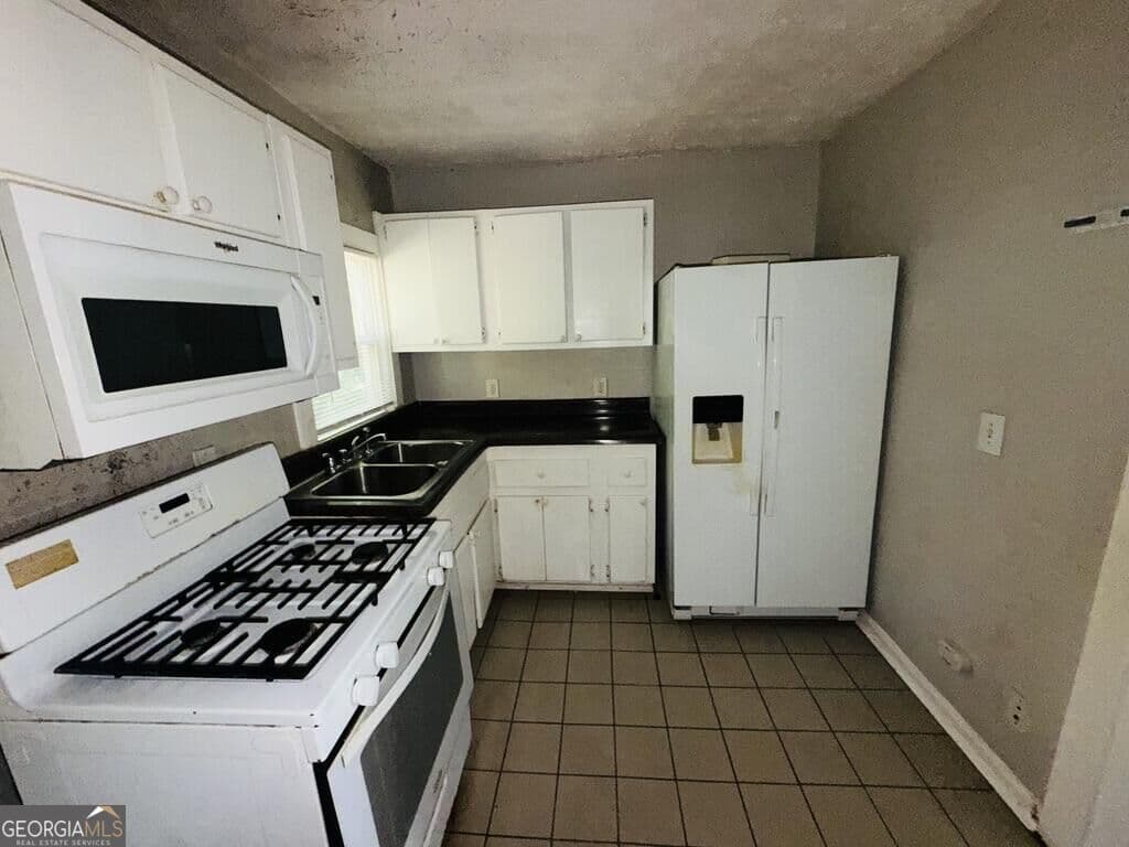3 bedroom, 1 bathroom, 1,080 sq ft single family residence for sale at 2835 Burton Road, Atlanta, GA 30311 — photo 6