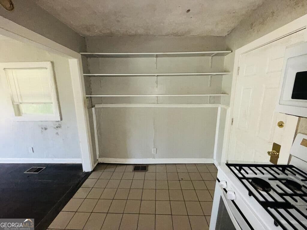 3 bedroom, 1 bathroom, 1,080 sq ft single family residence for sale at 2835 Burton Road, Atlanta, GA 30311 — photo 8