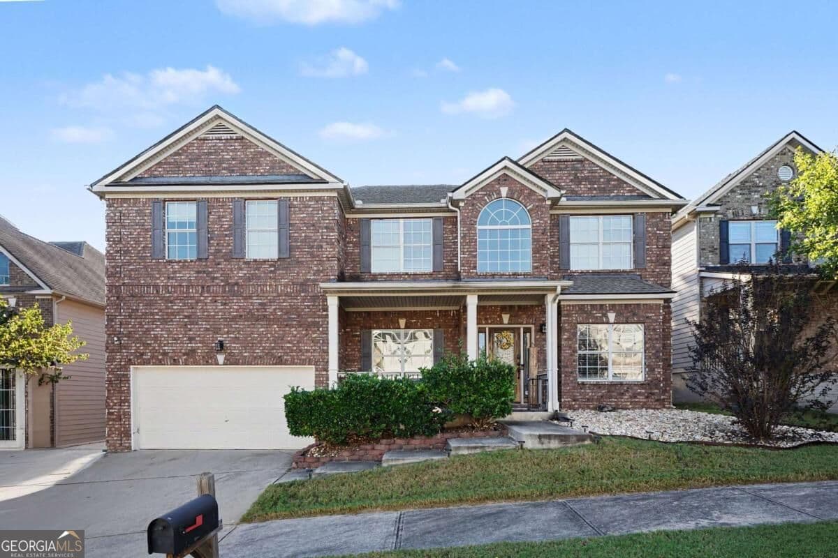 6 bedroom, 4 bathroom, 3,656 sq ft single family residence for sale at 3609 River Rock Road, Lithonia, GA 30038 — photo 2