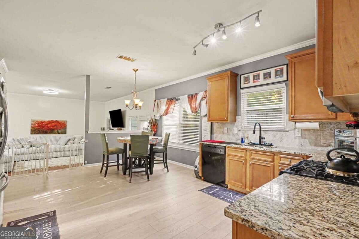6 bedroom, 4 bathroom, 3,656 sq ft single family residence for sale at 3609 River Rock Road, Lithonia, GA 30038 — photo 9