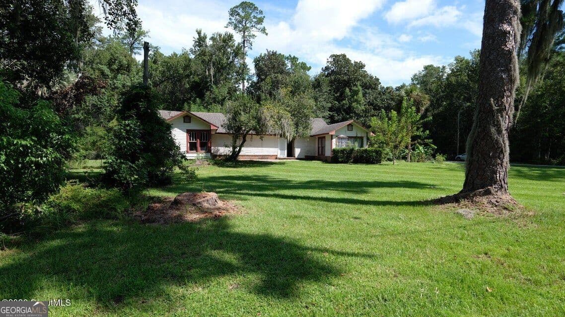 4 bedroom, 3 bathroom, 2,202 sq ft single family residence for sale at 402 W 3Rd Street, Woodbine, GA 31569 — photo 6