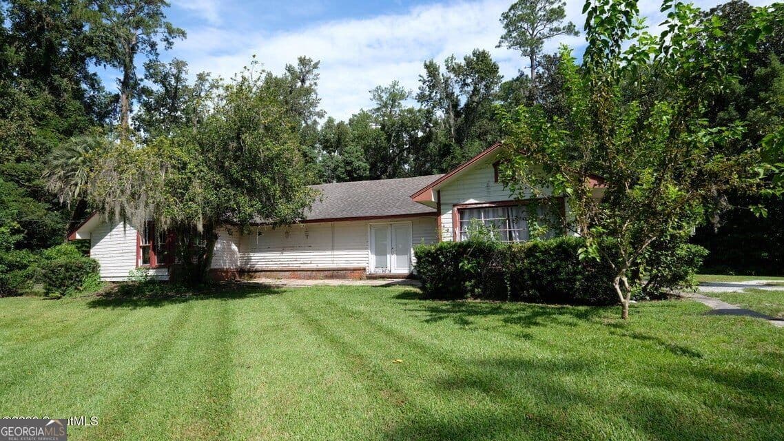 4 bedroom, 3 bathroom, 2,202 sq ft single family residence for sale at 402 W 3Rd Street, Woodbine, GA 31569 — photo 3