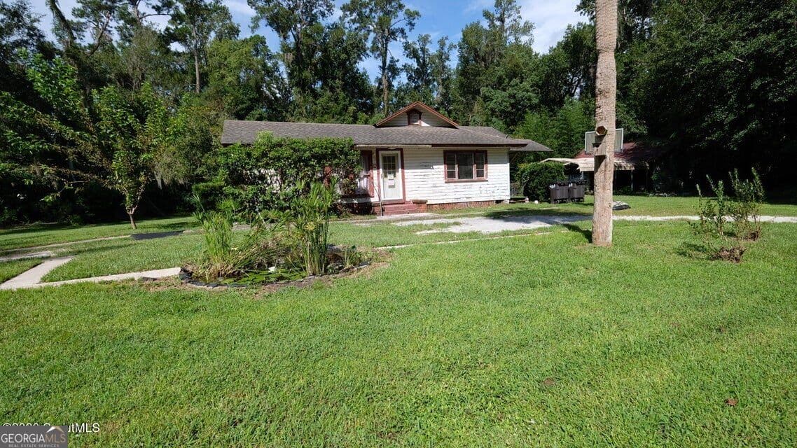 4 bedroom, 3 bathroom, 2,202 sq ft single family residence for sale at 402 W 3Rd Street, Woodbine, GA 31569 — photo 5