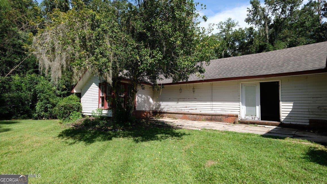 4 bedroom, 3 bathroom, 2,202 sq ft single family residence for sale at 402 W 3Rd Street, Woodbine, GA 31569 — photo 4