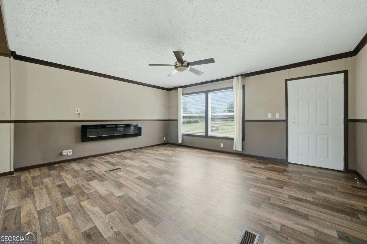 4 bedroom, 2 bathroom, 2,040 sq ft manufactured home,single family residence for sale at 23601 Georgia Highway 100, Roopville, GA 30170 — photo 3