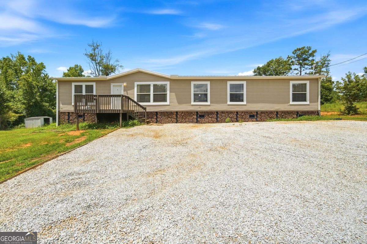 4 bedroom, 2 bathroom, 2,040 sq ft manufactured home,single family residence for sale at 23601 Georgia Highway 100, Roopville, GA 30170