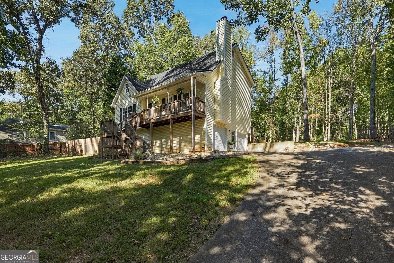 4 bedroom, 2 bathroom, 1,972 sq ft single family residence for sale at 3021 Mills Ridge Drive, Canton, GA 30114 — photo 2