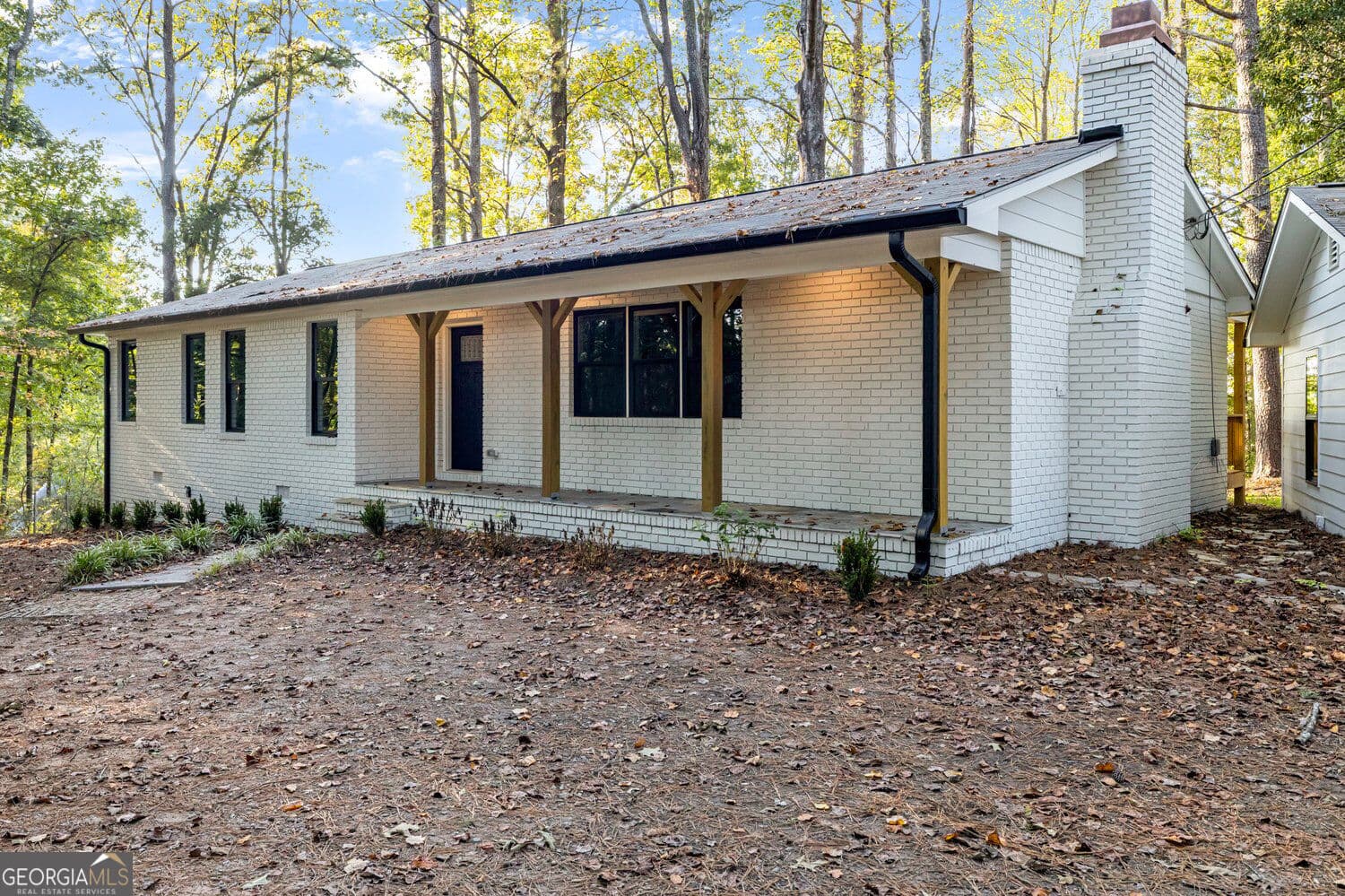 2 bedroom, 1.5 bathroom, 1,484 sq ft single family residence for sale at 6309 Putnam Ford Drive, Woodstock, GA 30189 — photo 2