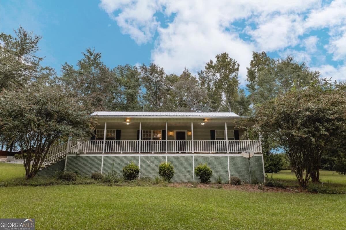 3 bedroom, 2 bathroom, 1,452 sq ft single family residence for sale at 1052 Spencer Road, Millen, GA 30442 — photo 1 of 27