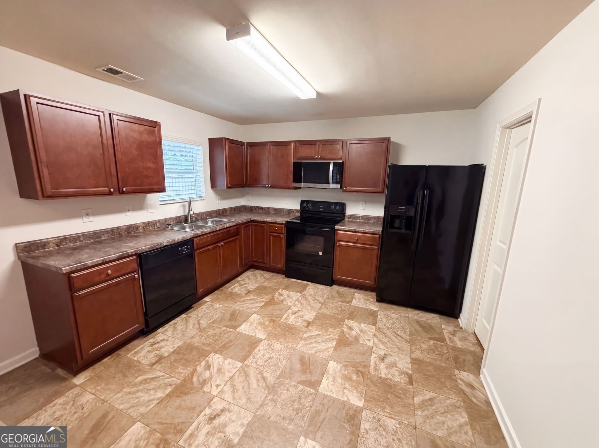 4 bedroom, 2.5 bathroom, 1,813 sq ft single family residence for sale at 3267 Talkeetna Road, Douglasville, GA 30135 — photo 2
