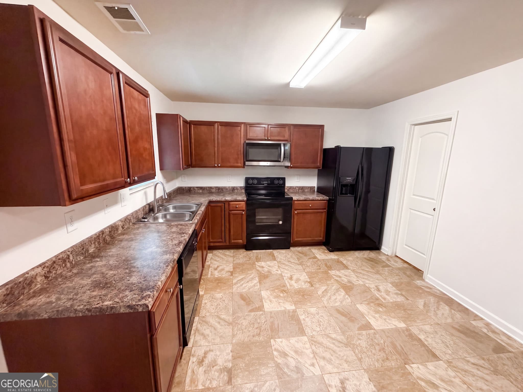 4 bedroom, 2.5 bathroom, 1,813 sq ft single family residence for sale at 3267 Talkeetna Road, Douglasville, GA 30135 — photo 7