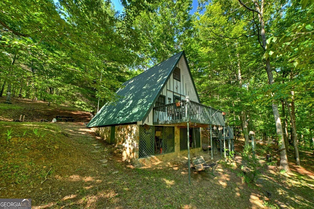 1 bedroom, 1 bathroom, 780 sq ft cabin,single family residence for sale at 32 Lake Front Drive, Morganton, GA 30560 — photo 3
