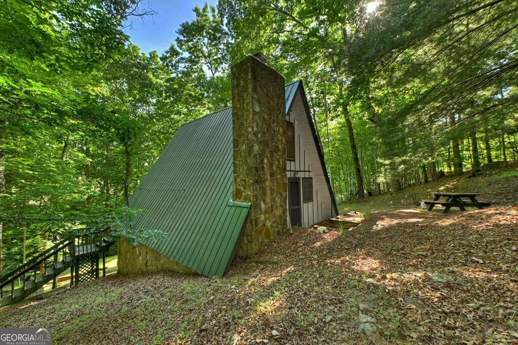 1 bedroom, 1 bathroom, 780 sq ft cabin,single family residence for sale at 32 Lake Front Drive, Morganton, GA 30560 — photo 5