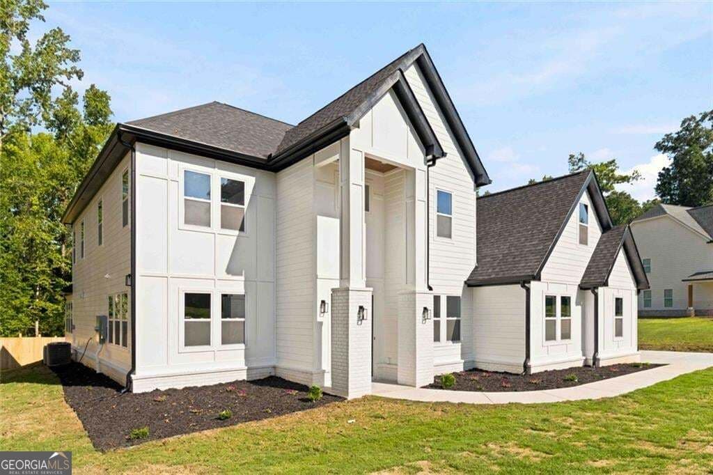 6 bedroom, 5.5 bathroom, 5,450 sq ft single family residence for sale at 1731 Cardinal Drive, Griffin, GA 30223 — photo 2