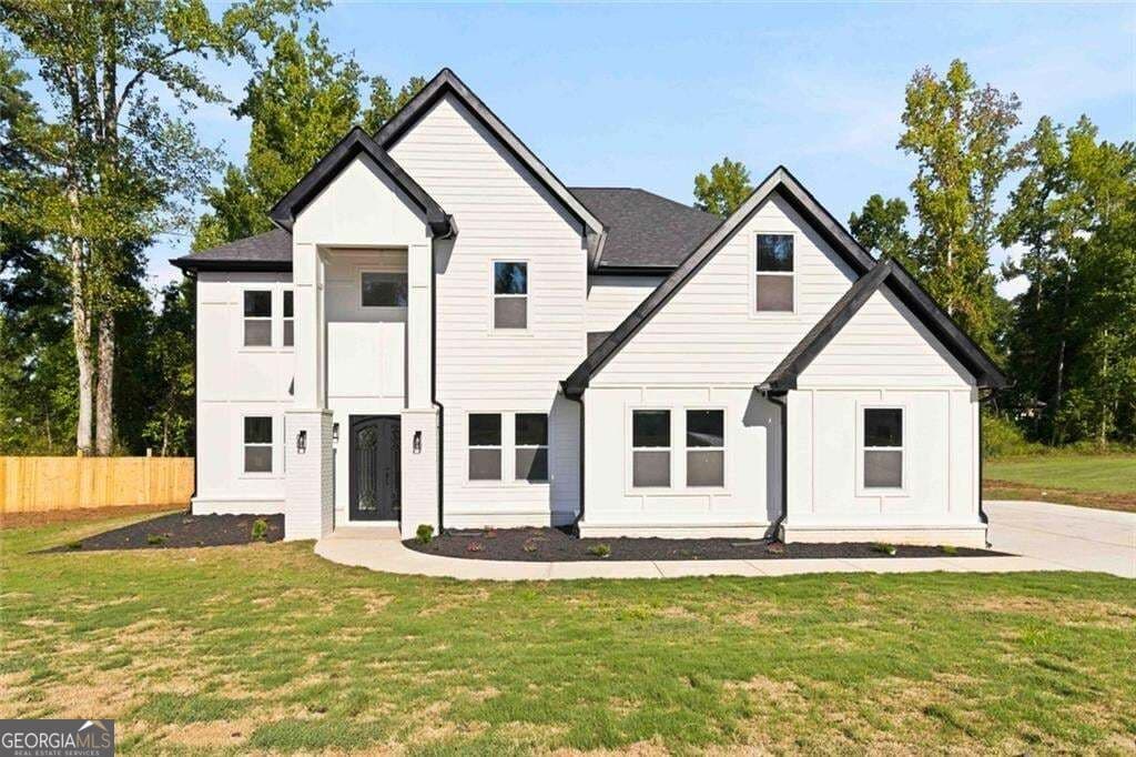 6 bedroom, 5.5 bathroom, 5,450 sq ft single family residence for sale at 1731 Cardinal Drive, Griffin, GA 30223 — photo 1 of 76