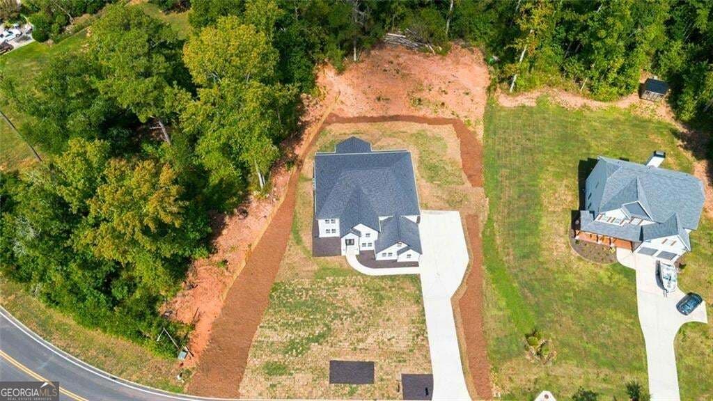 6 bedroom, 5.5 bathroom, 5,450 sq ft single family residence for sale at 1731 Cardinal Drive, Griffin, GA 30223 — photo 4