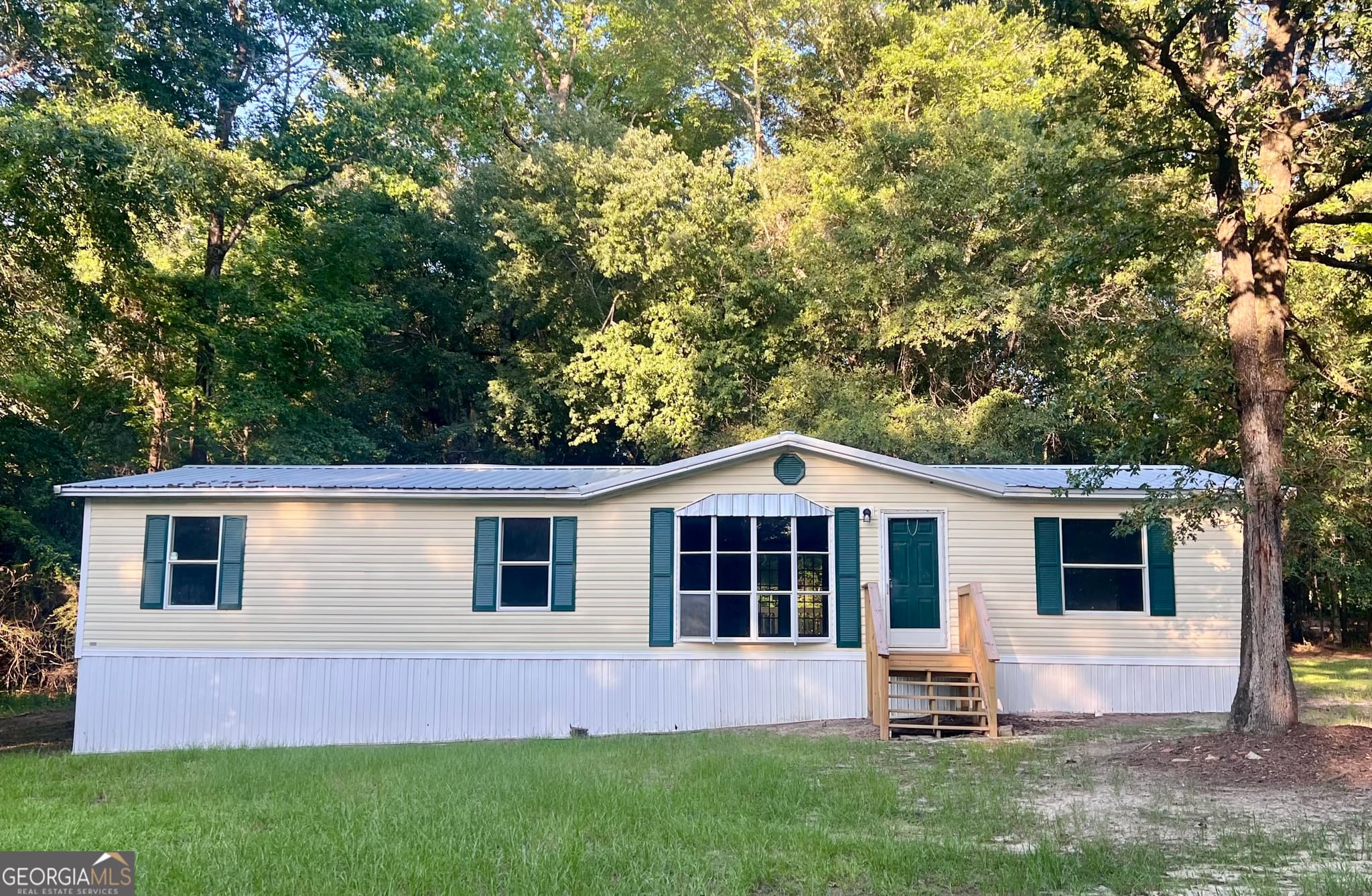3 bedroom, 2 bathroom, 1,456 sq ft manufactured home,single family residence for sale at 282 Sycamore Drive, Eastman, GA 31023 — photo 2