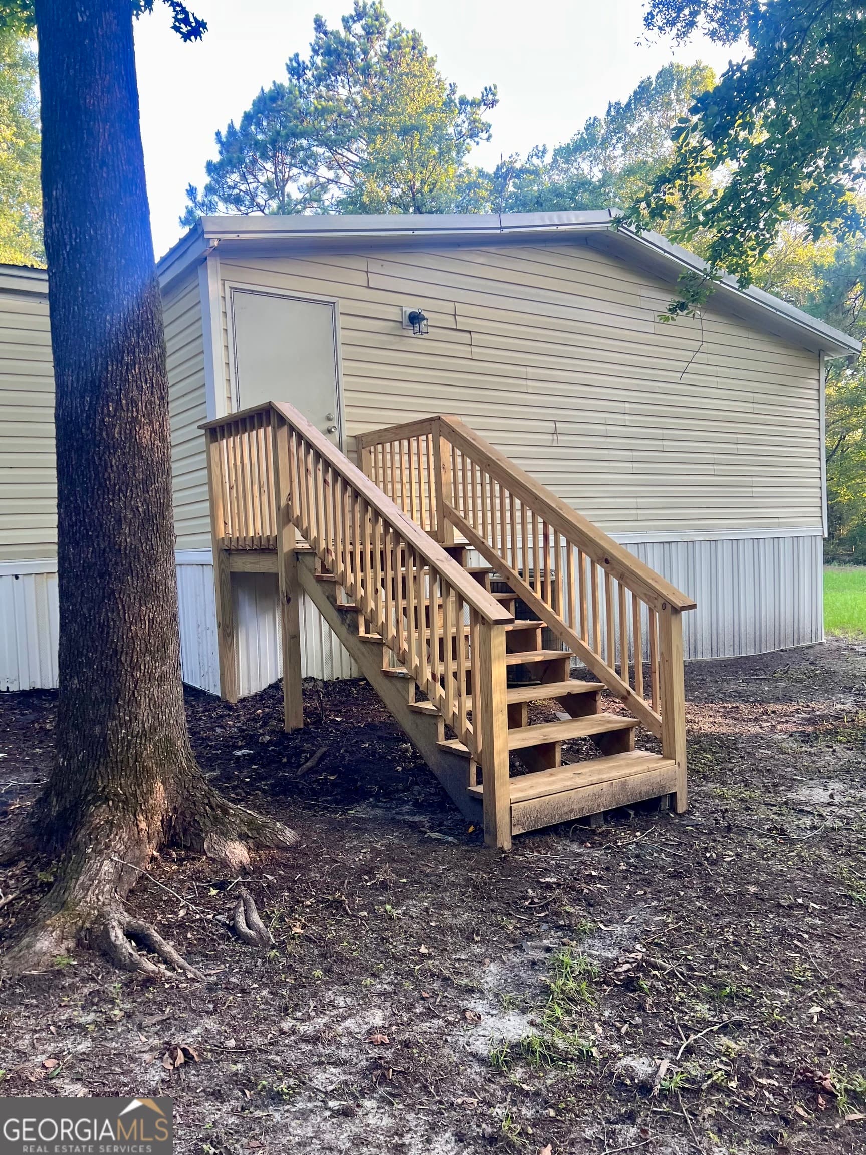 3 bedroom, 2 bathroom, 1,456 sq ft manufactured home,single family residence for sale at 282 Sycamore Drive, Eastman, GA 31023 — photo 6