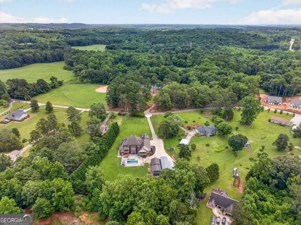 7 bedroom, 6.5 bathroom, 9,752 sq ft single family residence under contract at 4728 E Reed Road, Gainesville, GA 30507 — photo 3