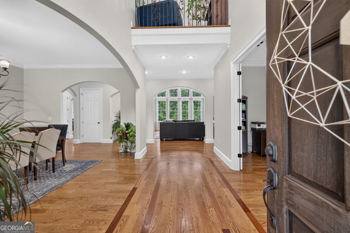 7 bedroom, 6.5 bathroom, 9,752 sq ft single family residence under contract at 4728 E Reed Road, Gainesville, GA 30507 — photo 5