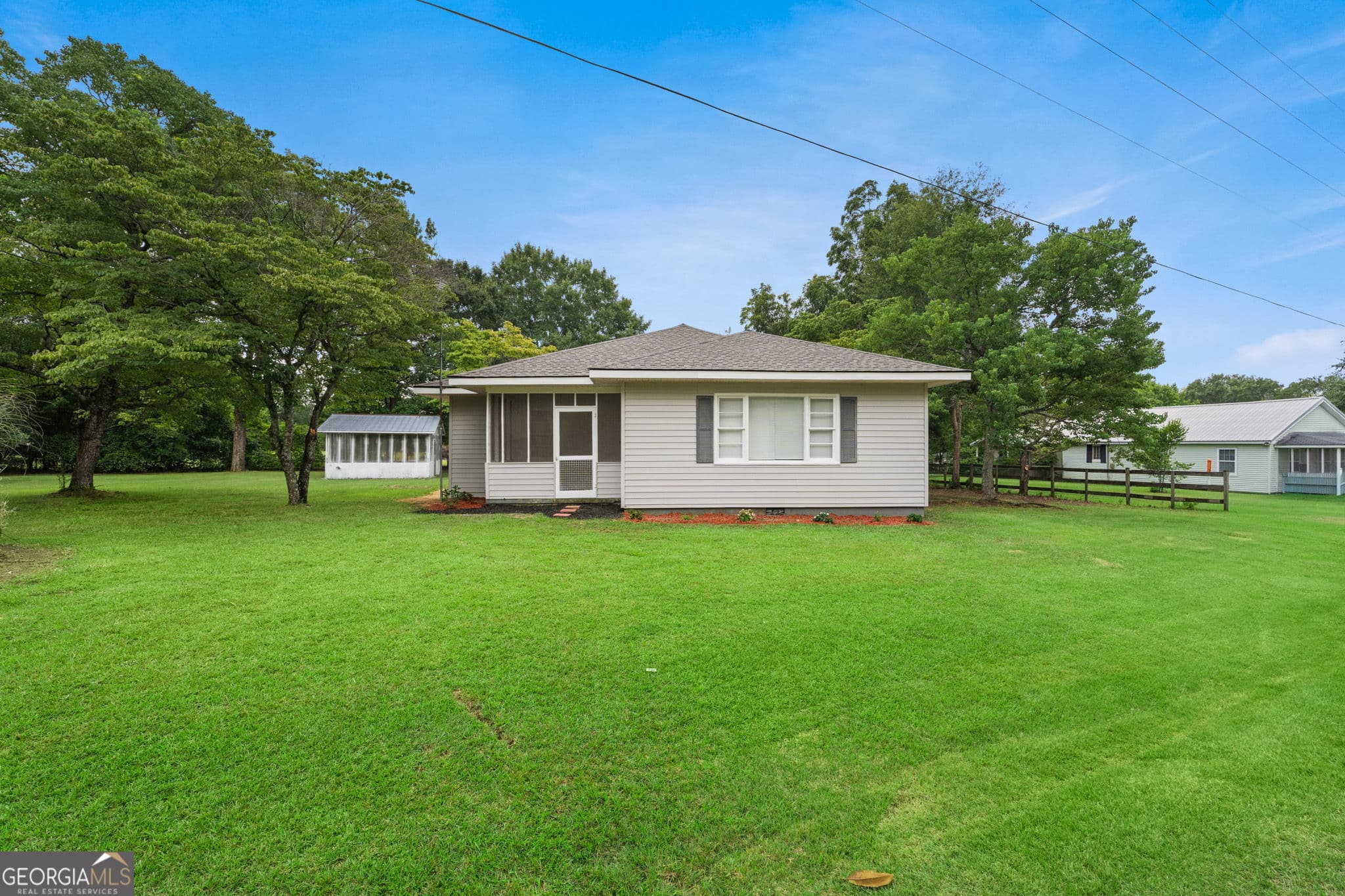 3 bedroom, 3 bathroom, 1,524 sq ft single family residence for sale at 1040 Tommy Purvis Jr, Reynolds, GA 31076 — photo 2