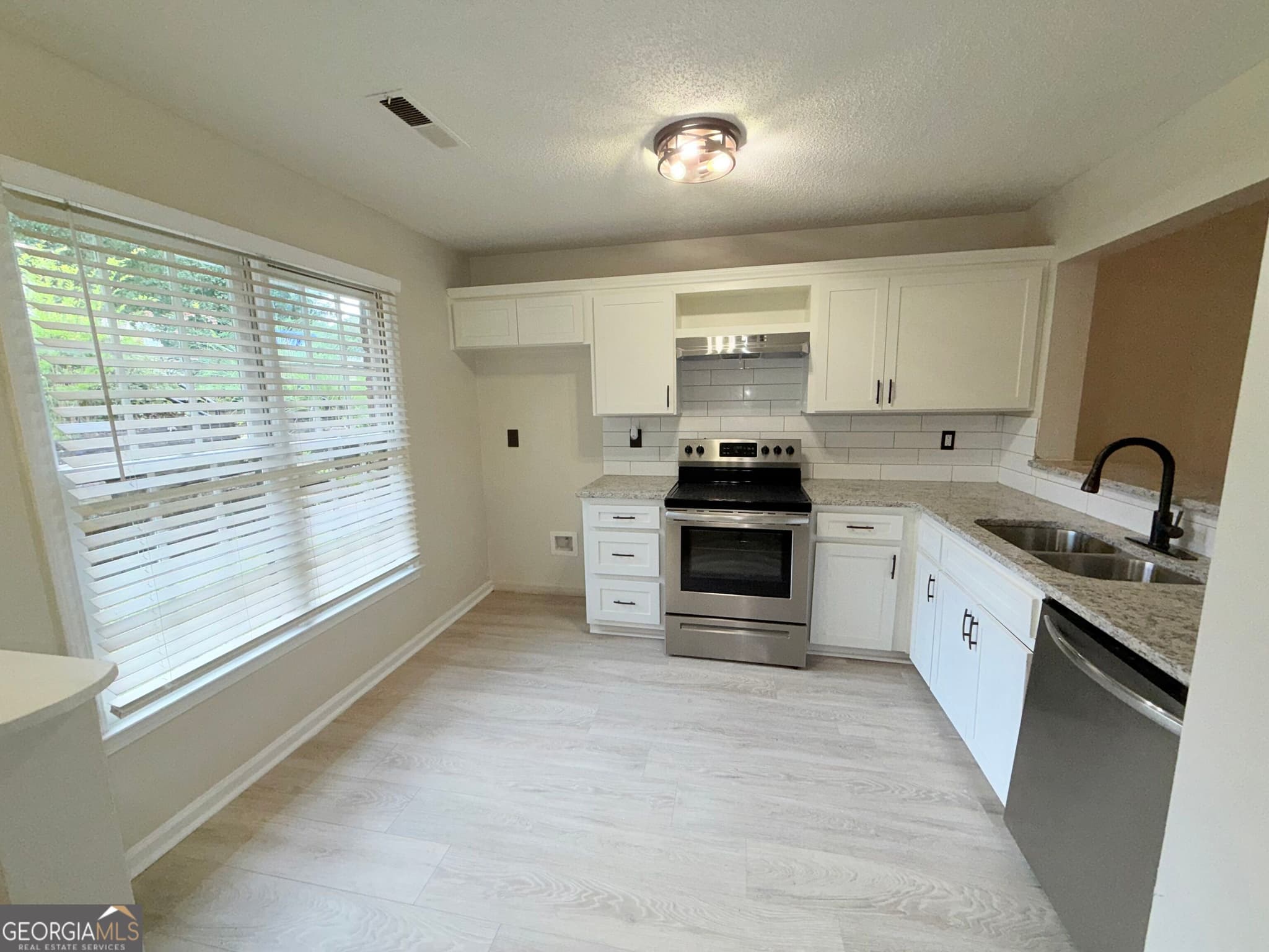 2 bedroom, 2.5 bathroom, 1,008 sq ft single family residence for sale at 1665 Winchester Way, Conyers, GA 30013 — photo 4