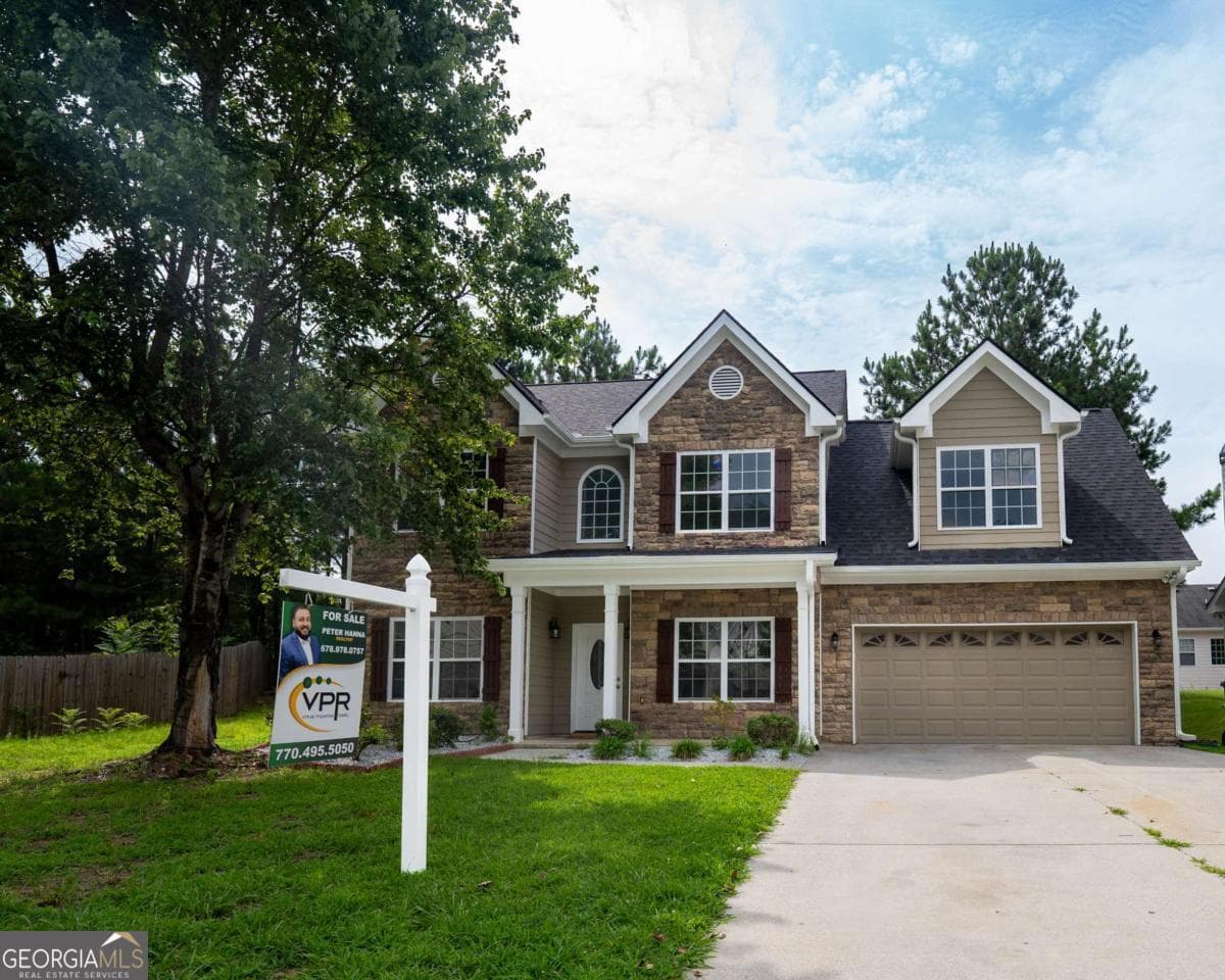 4 bedroom, 2.5 bathroom, 2,247 sq ft single family residence for sale at 6331 Stewart Ridge Walk, Buford, GA 30518 — photo 2