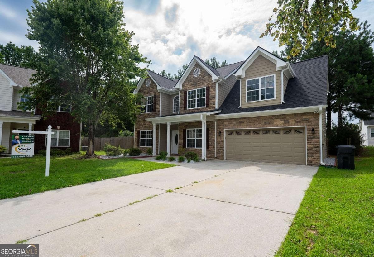4 bedroom, 2.5 bathroom, 2,247 sq ft single family residence for sale at 6331 Stewart Ridge Walk, Buford, GA 30518 — photo 3