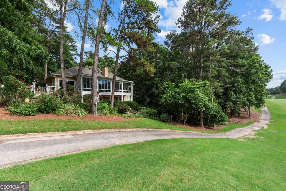 3 bedroom, 4 bathroom, 4,300 sq ft single family residence for sale at 1151 Shoulder Bone Circle, Greensboro, GA 30642 — photo 6