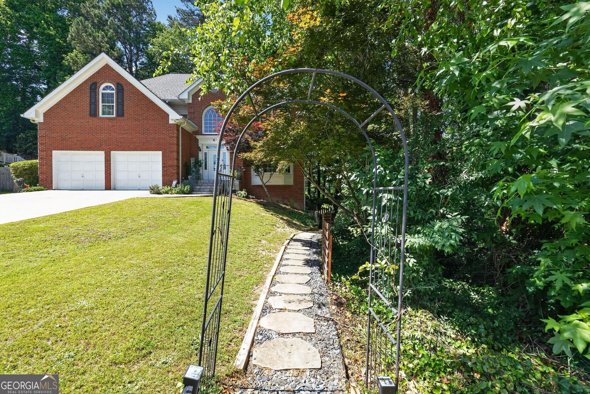 5 bedroom, 3.5 bathroom, 3,540 sq ft single family residence for sale at 1227 Camden Hunt Drive, Lawrenceville, GA 30043 — photo 2