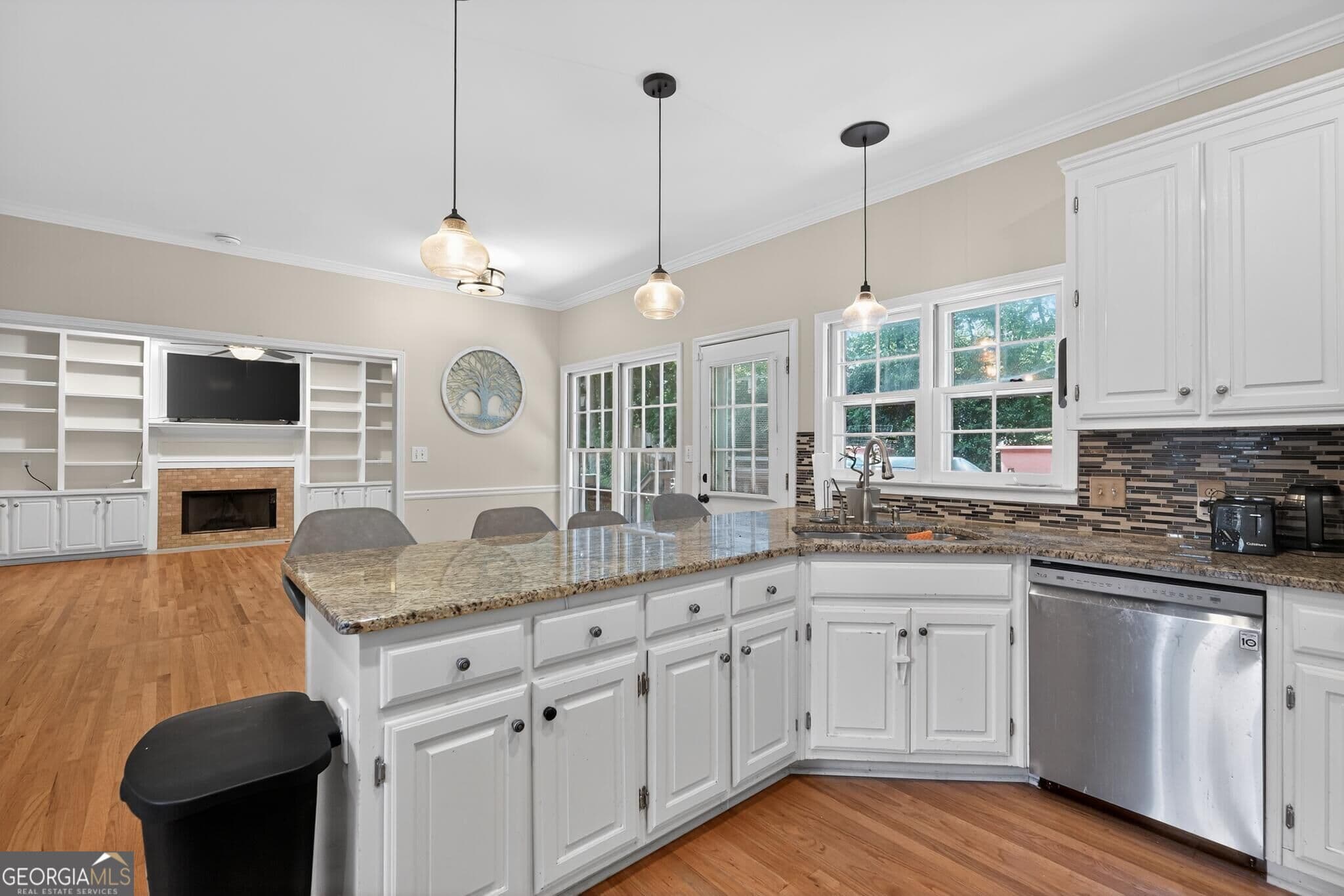 5 bedroom, 3.5 bathroom, 3,540 sq ft single family residence for sale at 1227 Camden Hunt Drive, Lawrenceville, GA 30043 — photo 6