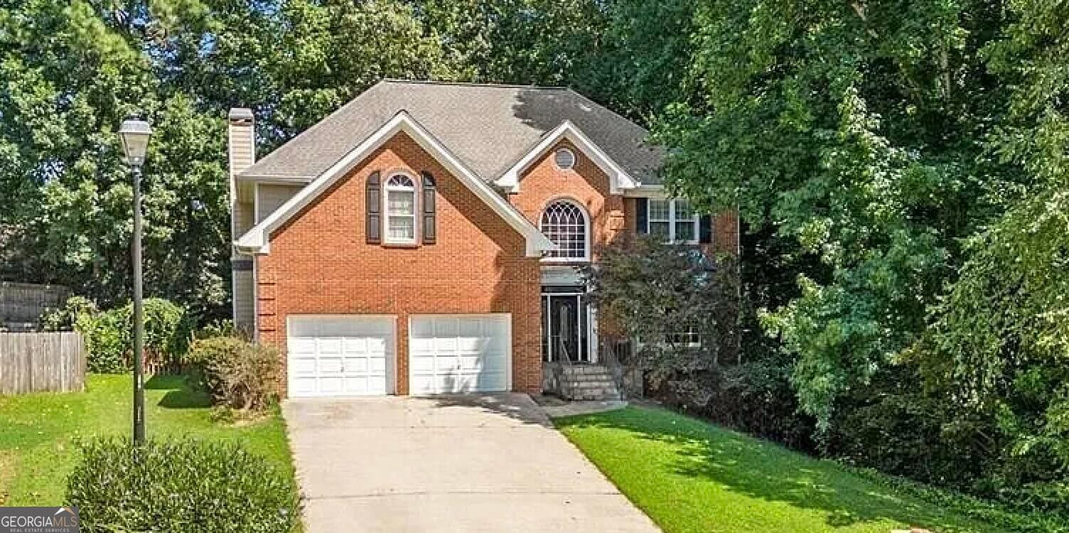 5 bedroom, 3.5 bathroom, 3,540 sq ft single family residence for sale at 1227 Camden Hunt Drive, Lawrenceville, GA 30043 — photo 1 of 41